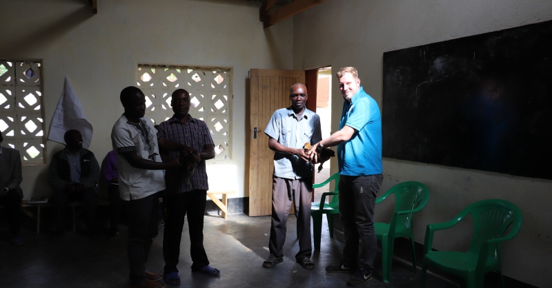 Receiving a chicken as a gift from community