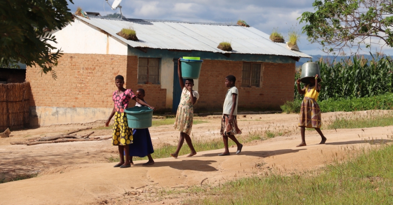 Children going to draw water