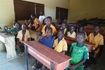 Children in classroom with furniture